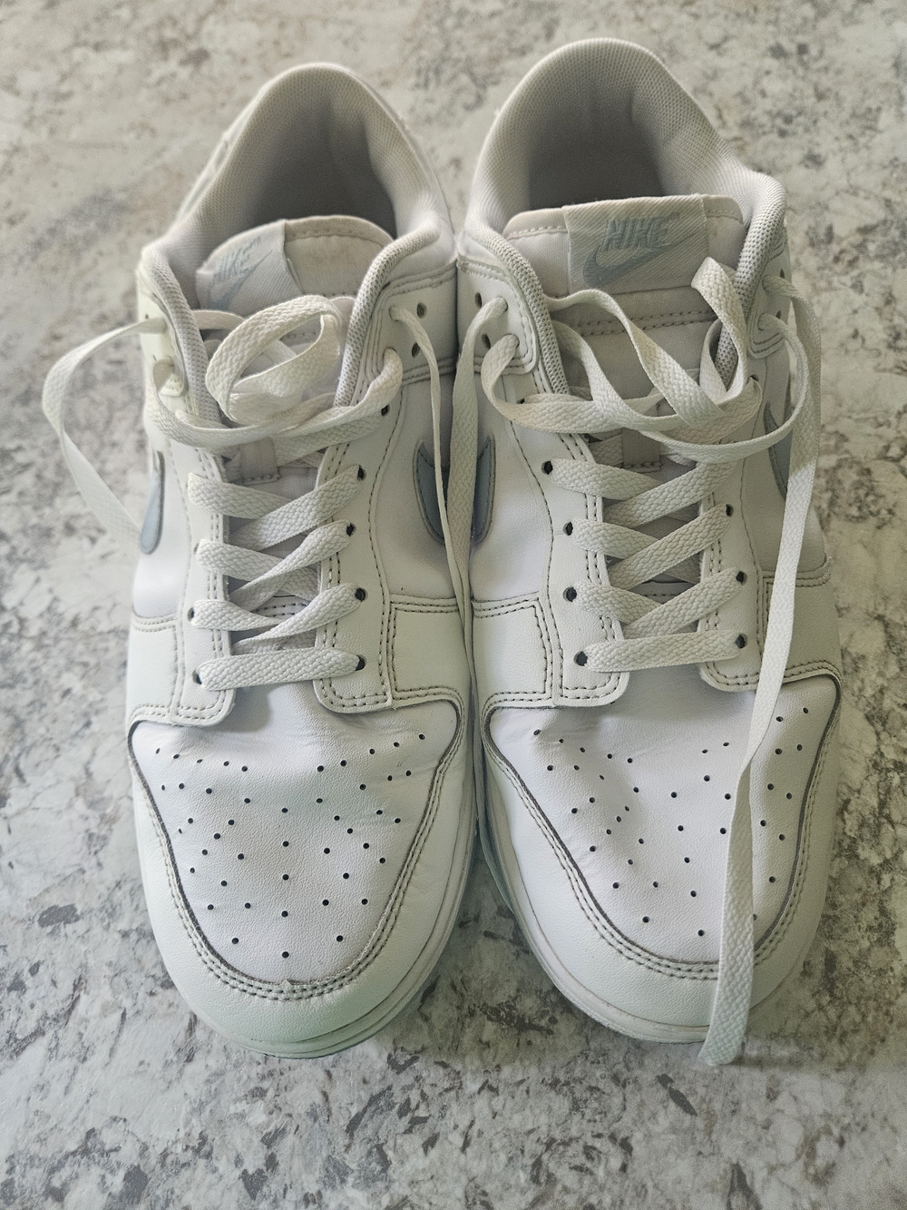 Nike Men's White Low-Top Sneakers with Light Blue Swoosh